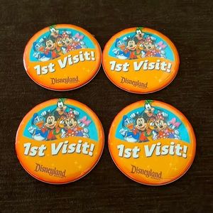 Disneyland Badges for the first visit. NWOB
